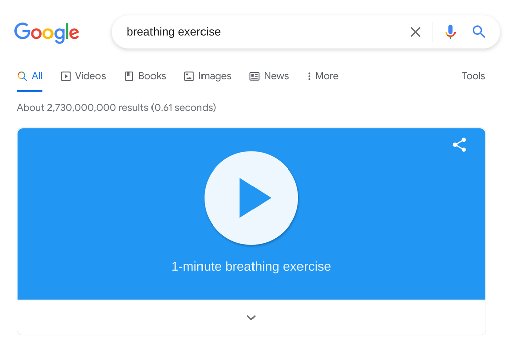 Screenshot of the term "breathing exercise" in a Google Search Bar. Below, there is a video with helpful exercises for users.
